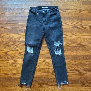 Levi’s distressed black jeans